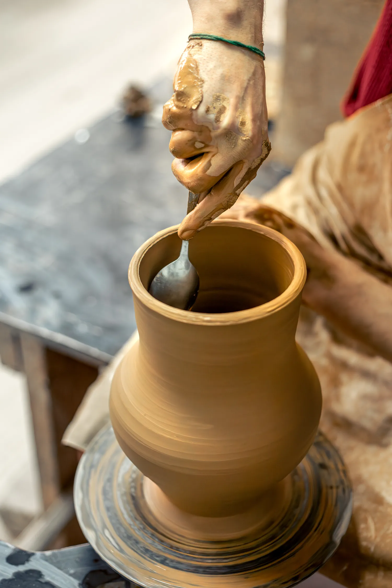 male-potter-is-making-vase-pottery-clay-modeling-making-ceramics